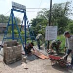 Babinsa Koramil Sukun Aktif Dukung Pembangunan Jembatan Perintis