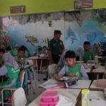 MBG Babinsa Tlogomas