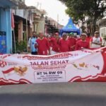 Semarak HUT ke-81 RI, Warga RT 14 RW 09 Sawojajar Gelar Jalan Sehat dan Senam Bahagia