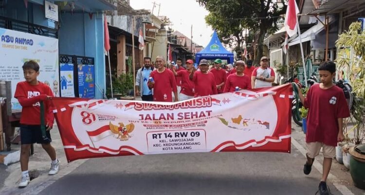 Semarak HUT ke-81 RI, Warga RT 14 RW 09 Sawojajar Gelar Jalan Sehat dan Senam Bahagia