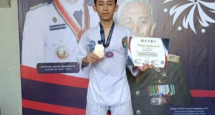 Tampil Gemilang, Wildan Syauqi Bawa Pulang Juara 3 Taekwondo Piala Gubernur Jatim