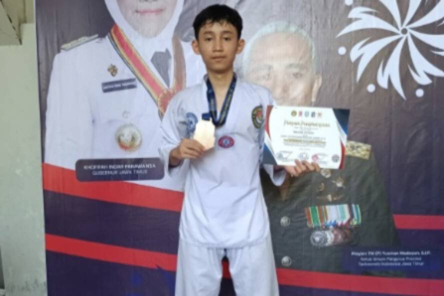 Tampil Gemilang, Wildan Syauqi Bawa Pulang Juara 3 Taekwondo Piala Gubernur Jatim